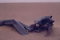 Sheet of metal in desert